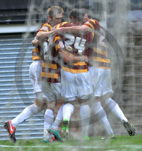 Bradford City players celebrate Nahki Wells goal