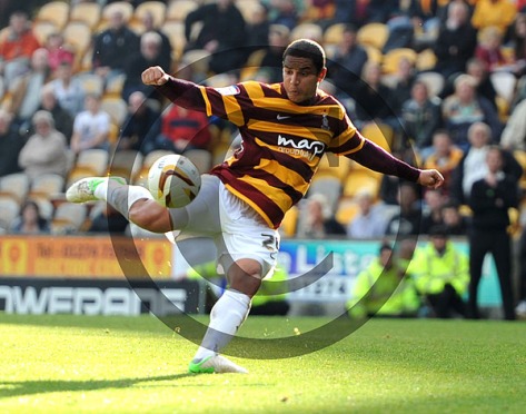 Nathan Doyle clears the danger for Bradford City 