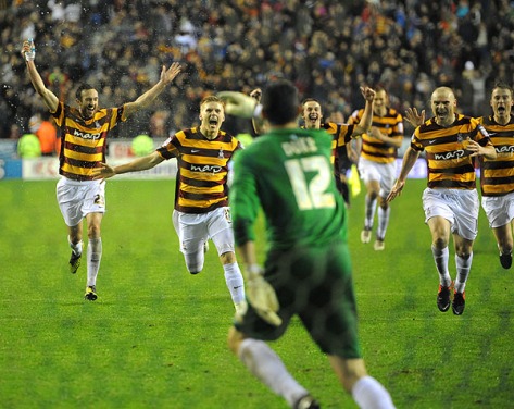 The players celebrate getting through to the last 8 of the Capital One Cup